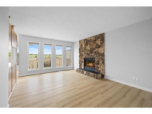 140 Sanderling Rise Nw, Calgary, AB - Indoor Photo Showing Living Room With Fireplace