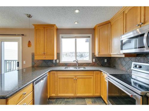 3507 49 Street Sw, Calgary, AB - Indoor Photo Showing Kitchen With Double Sink