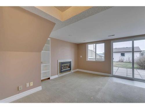 3507 49 Street Sw, Calgary, AB - Indoor With Fireplace