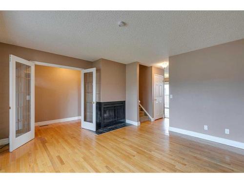 3507 49 Street Sw, Calgary, AB - Indoor Photo Showing Living Room With Fireplace
