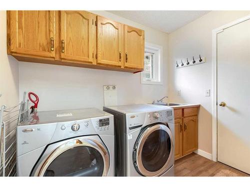 21 Deer River Green Se, Calgary, AB - Indoor Photo Showing Laundry Room