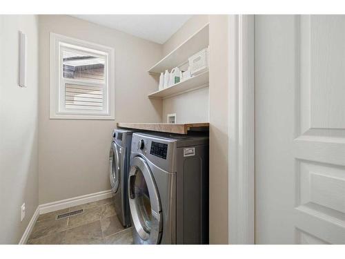 16 Covepark Mews Ne, Calgary, AB - Indoor Photo Showing Laundry Room