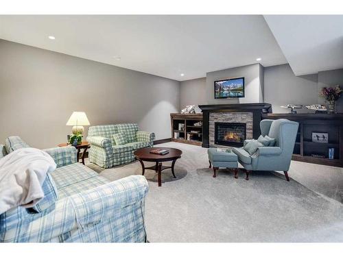 13 Spyglass Point, Rural Rocky View County, AB - Indoor Photo Showing Living Room With Fireplace