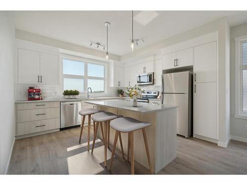 701-400 Belmont Street Sw, Calgary, AB - Indoor Photo Showing Kitchen With Upgraded Kitchen