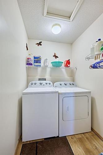 843 Harvest Hills Drive Ne, Calgary, AB - Indoor Photo Showing Laundry Room