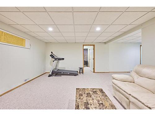 843 Harvest Hills Drive Ne, Calgary, AB - Indoor Photo Showing Gym Room