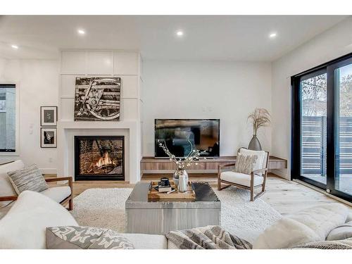 1619 9 Street Nw, Calgary, AB - Indoor Photo Showing Living Room With Fireplace