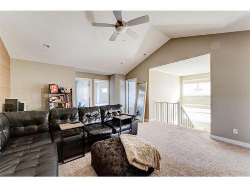 155 Kinniburgh Road, Chestermere, AB - Indoor Photo Showing Living Room