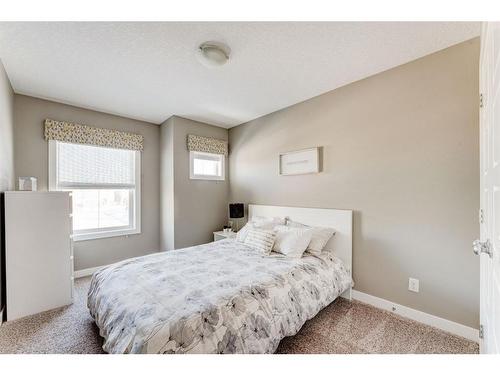 155 Kinniburgh Road, Chestermere, AB - Indoor Photo Showing Bedroom