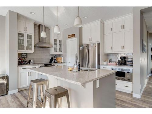155 Kinniburgh Road, Chestermere, AB - Indoor Photo Showing Kitchen With Upgraded Kitchen
