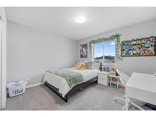 108 Hawkmere Way, Chestermere, AB - Indoor Photo Showing Bedroom