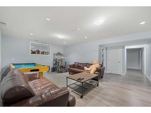 108 Hawkmere Way, Chestermere, AB - Indoor Photo Showing Living Room