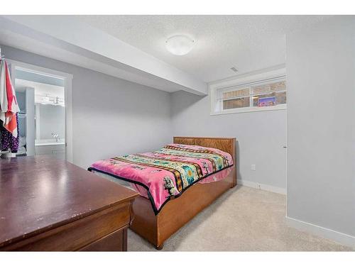 108 Hawkmere Way, Chestermere, AB - Indoor Photo Showing Bedroom