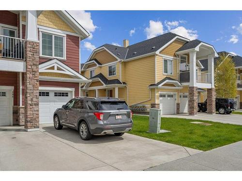 322-2400 Ravenswood View Se, Airdrie, AB - Outdoor With Facade