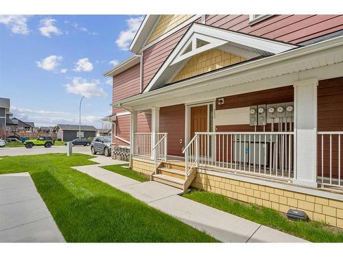 322-2400 Ravenswood View Se, Airdrie, AB - Outdoor With Deck Patio Veranda