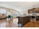 322-2400 Ravenswood View Se, Airdrie, AB  - Indoor Photo Showing Kitchen 