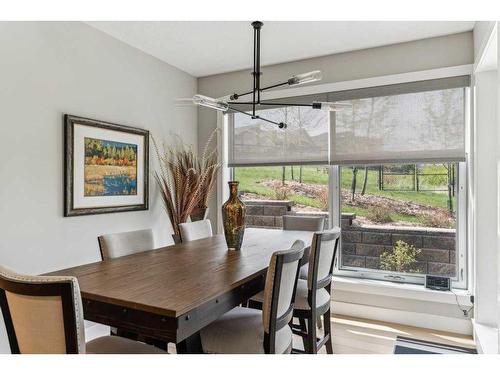 110-15 Cougar Ridge Landing Sw, Calgary, AB - Indoor Photo Showing Dining Room