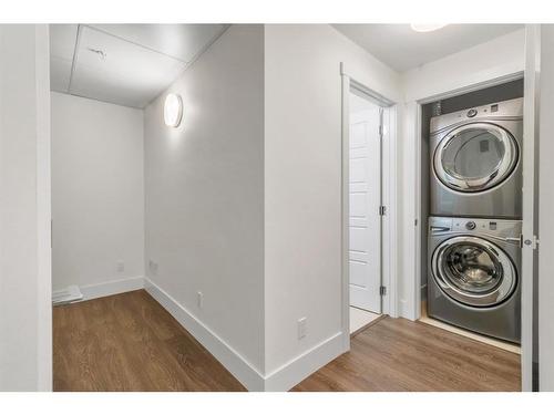 106-3320 3 Avenue Nw, Calgary, AB - Indoor Photo Showing Laundry Room