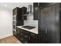 106-3320 3 Avenue Nw, Calgary, AB  - Indoor Photo Showing Kitchen With Upgraded Kitchen 