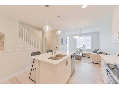 31 Crestbrook Drive Sw, Calgary, AB - Indoor Photo Showing Kitchen With Double Sink With Upgraded Kitchen