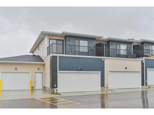 31 Crestbrook Drive Sw, Calgary, AB - Outdoor With Balcony