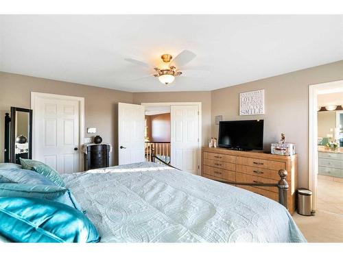 59 Signature Heights Sw, Calgary, AB - Indoor Photo Showing Bedroom