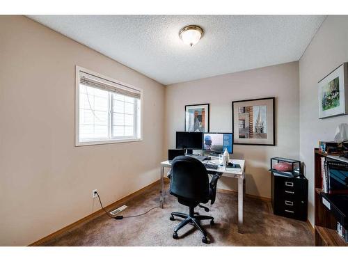 218 Arbour Butte Road Nw, Calgary, AB - Indoor Photo Showing Office