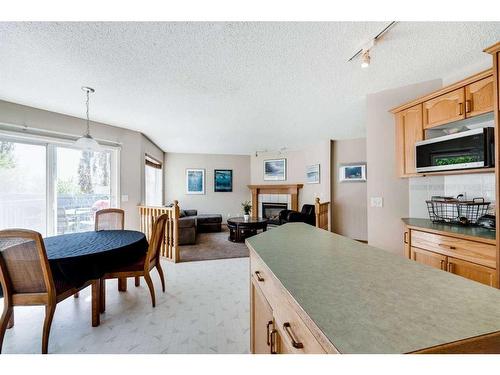 218 Arbour Butte Road Nw, Calgary, AB - Indoor Photo Showing Other Room