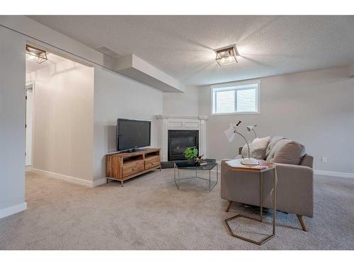 40 Tuscany Valley Park Nw, Calgary, AB - Indoor With Fireplace