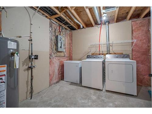 40 Tuscany Valley Park Nw, Calgary, AB - Indoor Photo Showing Laundry Room