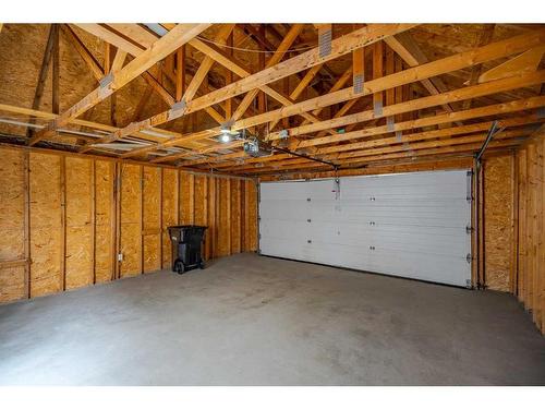 40 Tuscany Valley Park Nw, Calgary, AB - Indoor Photo Showing Garage