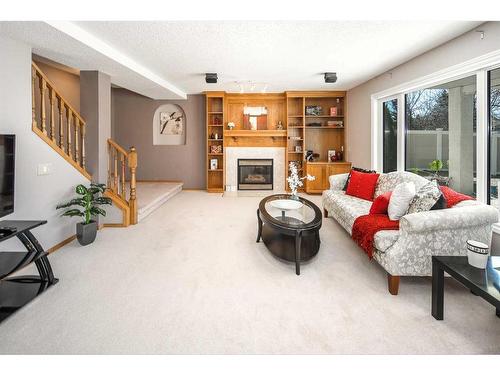 4065 Edgevalley Landing Nw, Calgary, AB - Indoor Photo Showing Other Room With Fireplace