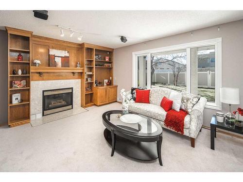 4065 Edgevalley Landing Nw, Calgary, AB - Indoor Photo Showing Living Room With Fireplace