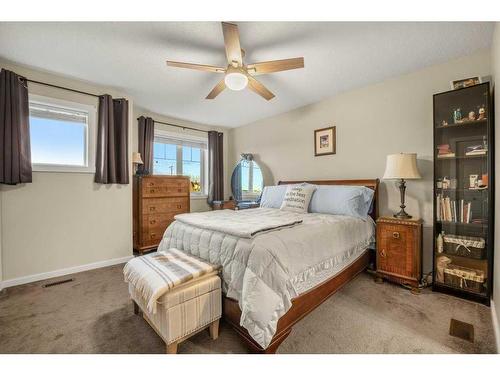 1307-2400 Ravenswood View Se, Airdrie, AB - Indoor Photo Showing Bedroom