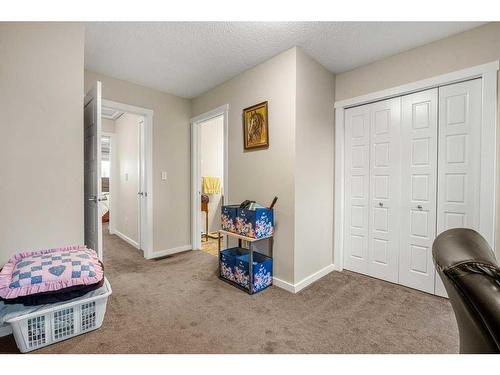 1307-2400 Ravenswood View Se, Airdrie, AB - Indoor Photo Showing Other Room