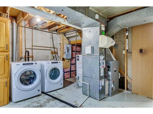 4747 Nipawin Crescent Nw, Calgary, AB - Indoor Photo Showing Laundry Room