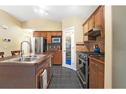 137 Silverado Plains Close Sw, Calgary, AB - Indoor Photo Showing Kitchen With Double Sink