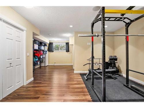 137 Silverado Plains Close Sw, Calgary, AB - Indoor Photo Showing Gym Room