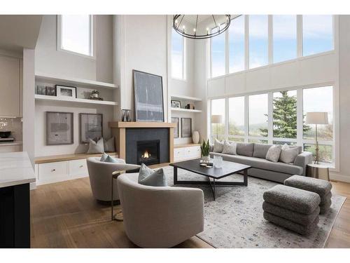 127 Winding River Rise, Rural Rocky View County, AB - Indoor Photo Showing Living Room With Fireplace