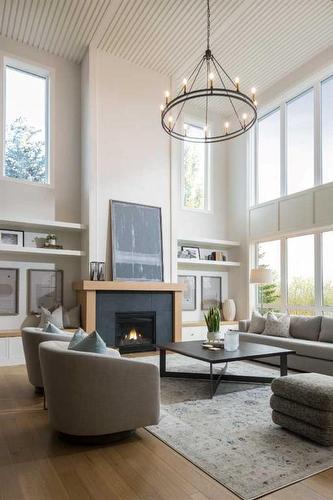 127 Winding River Rise, Rural Rocky View County, AB - Indoor Photo Showing Living Room With Fireplace