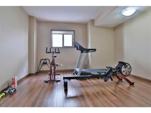 51 Hamptons Close Nw, Calgary, AB - Indoor Photo Showing Gym Room