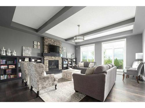 37 Artesia Pointe, Heritage Pointe, AB - Indoor Photo Showing Living Room With Fireplace