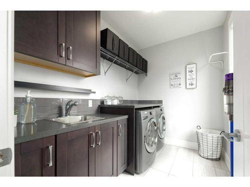 37 Artesia Pointe, Heritage Pointe, AB - Indoor Photo Showing Laundry Room