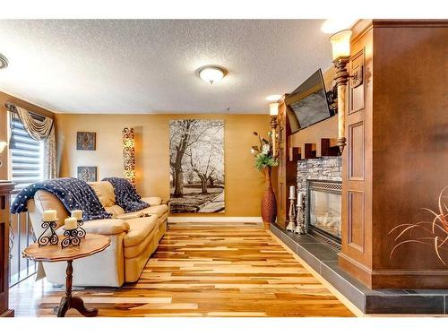 44 Sage Hill Way, Calgary, AB - Indoor Photo Showing Living Room With Fireplace