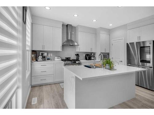 12 Harvest Grove Common Ne, Calgary, AB - Indoor Photo Showing Kitchen With Upgraded Kitchen
