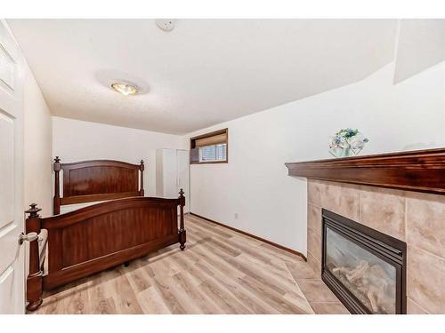 67 Panamount Circle Nw, Calgary, AB - Indoor With Fireplace