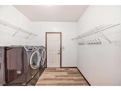 67 Panamount Circle Nw, Calgary, AB - Indoor Photo Showing Laundry Room