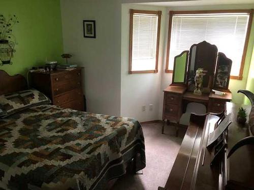 675054 Range Road 183, Rural Athabasca County, AB - Indoor Photo Showing Bedroom