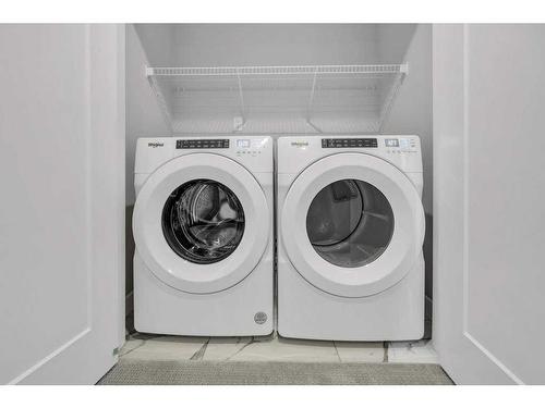 733 Carrington Boulevard, Calgary, AB - Indoor Photo Showing Laundry Room