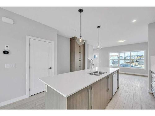 733 Carrington Boulevard, Calgary, AB - Indoor Photo Showing Kitchen With Double Sink